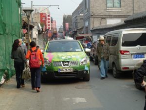 First electric car driving round the world; From Denmark to China